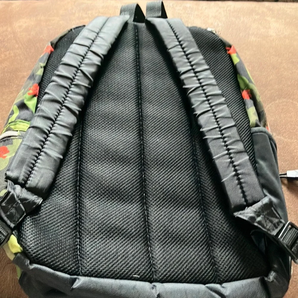 Camouflage Multi-Pocket‎ Backpack with Orange Skull & Crossbones